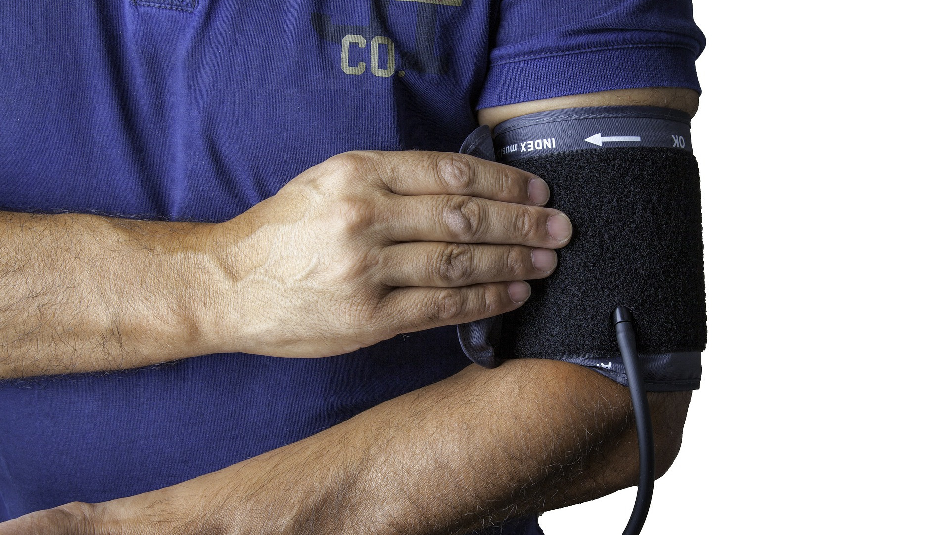 Man with a blood pressure monitor