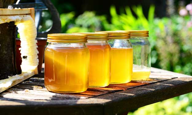 Jars Filled with Raw Honey.