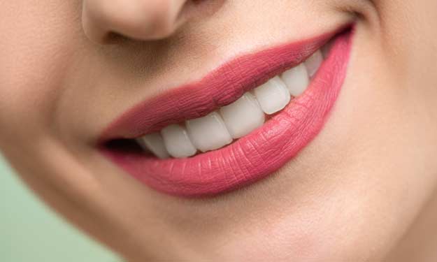 Naturally Whiten Teeth with These Home Remedies.
