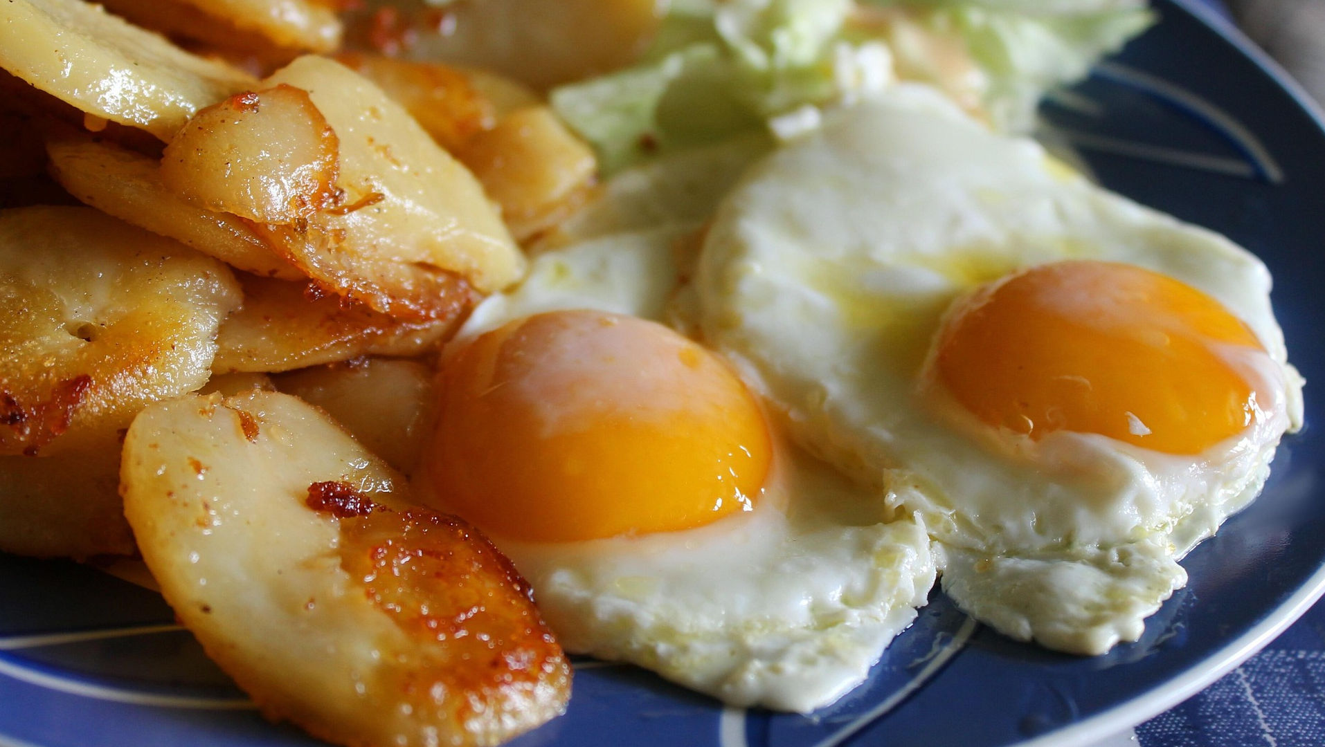 Fried eggs and potatoes