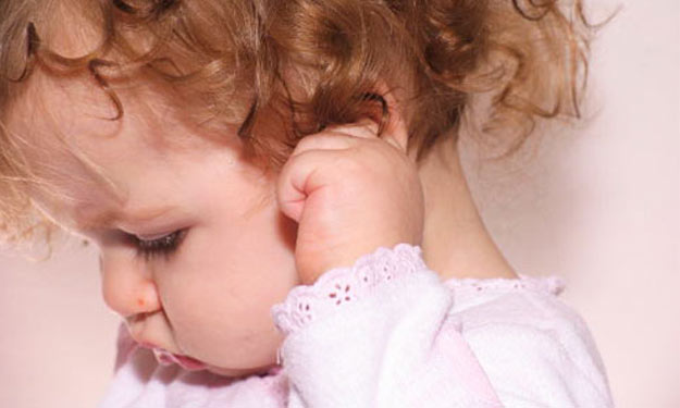 Young Girl with Ear Infection.