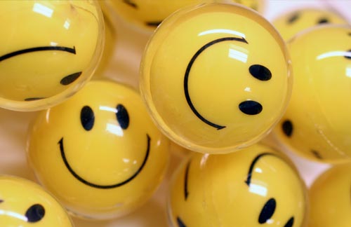 Plastic Yellow Balls with Smiley Faces.