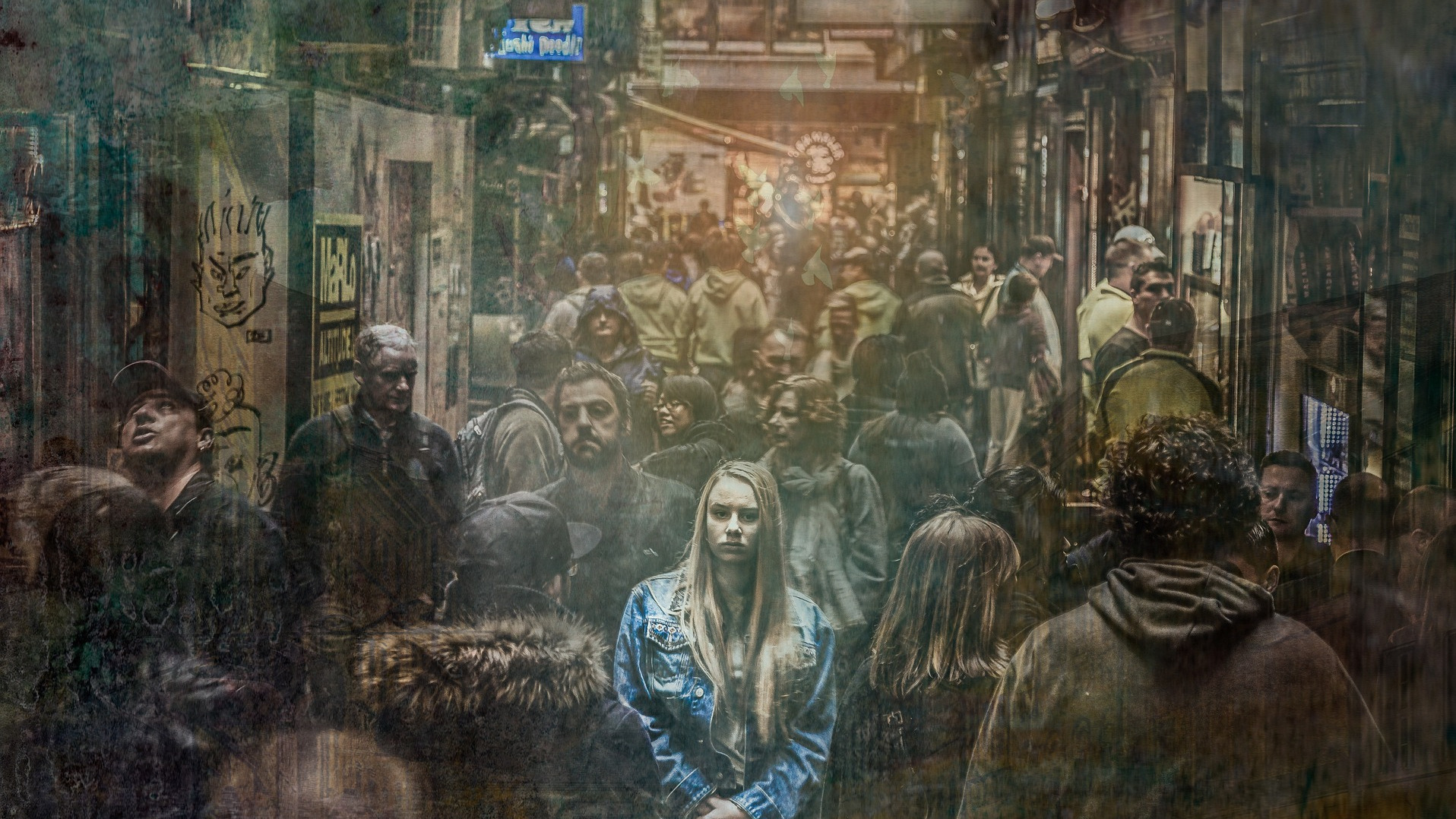 Depressed woman in the center of a crowd but alone